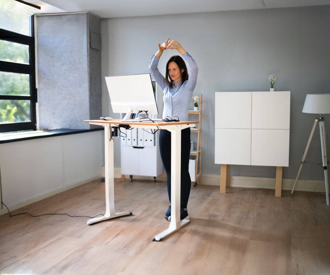 An Occupational Therapist smiles as she treats her patient.