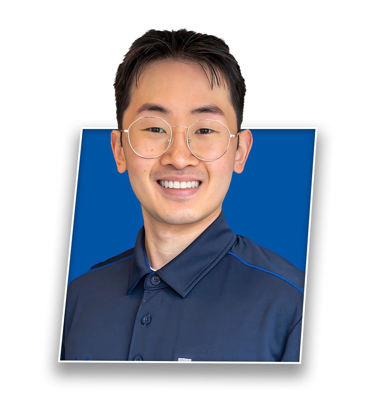 Headshot of Jimmy Dang, PT DPT, smiling in a blue Buffalo Rehab Group shirt.