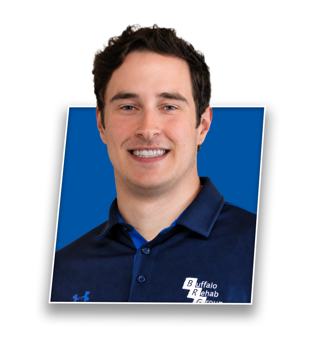 Headshot of Nick Herideen, PT DPT, smiling in a blue Buffalo Rehab Group shirt.