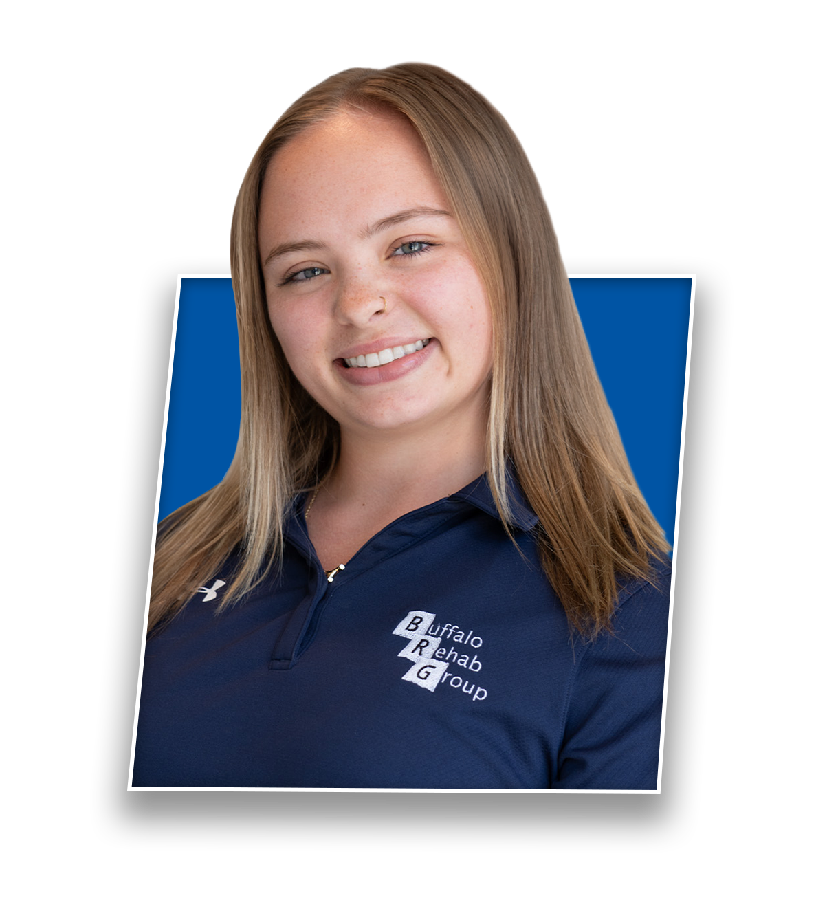 Headshot of Alana Szumla, PT DPT, smiling in a blue Buffalo Rehab Group shirt.