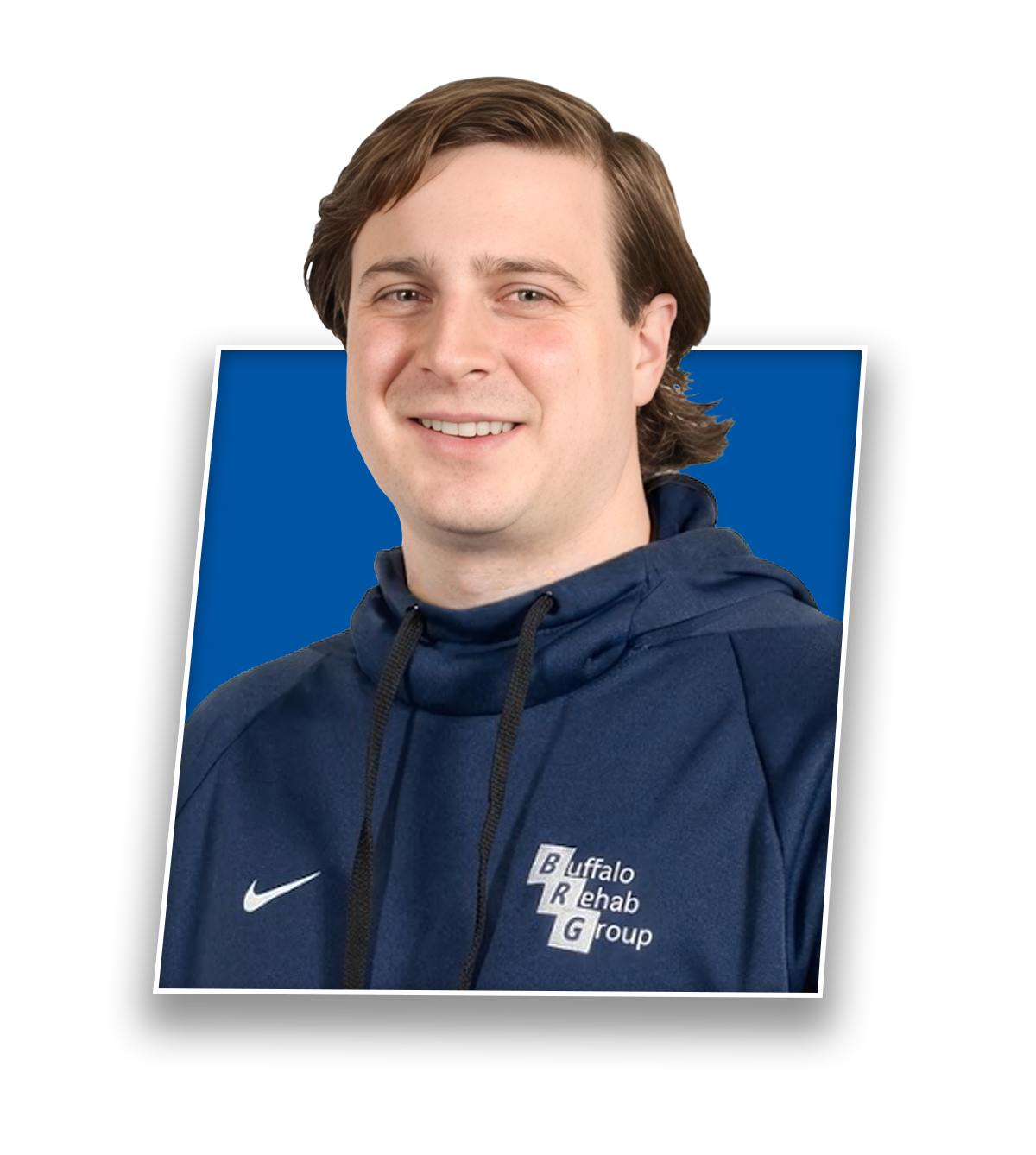 Headshot of Jake Woodrich, PT DPT CSCS, smiling in a blue Buffalo Rehab Group shirt.
