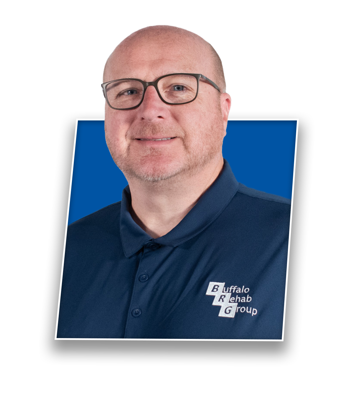 Headshot of Jeff Woodrich, PT, smiling in a blue Buffalo Rehab Group shirt.